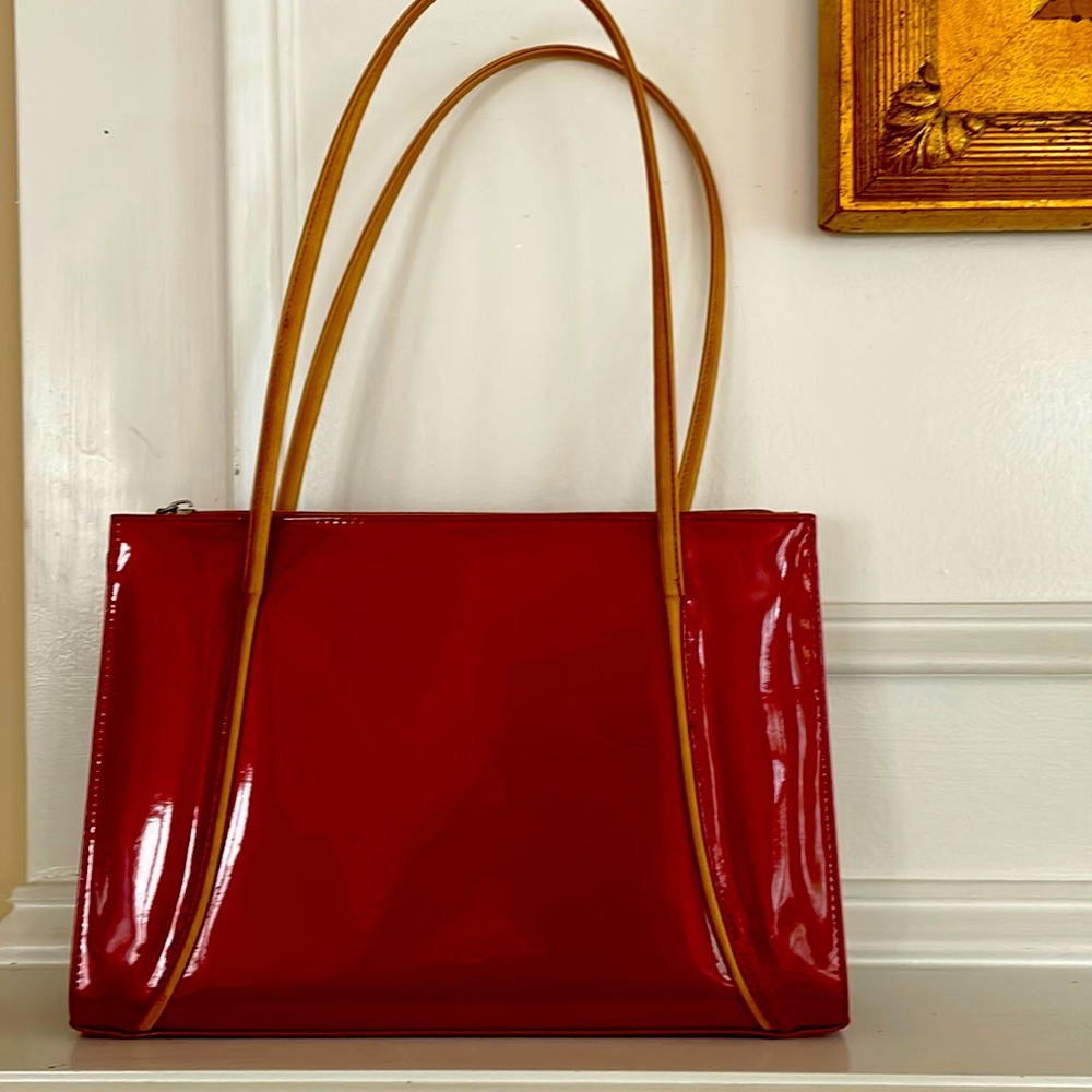 Red patent purse with tan straps